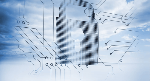 Giant padlock next to a circuit board with blue sky on the background